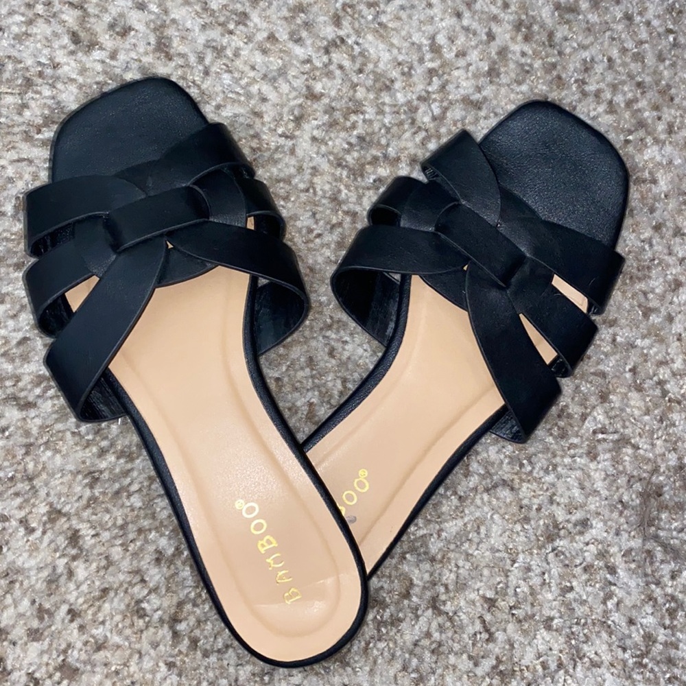 black slip on sandals sides